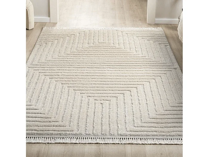 Alfombra rectangular con motivos grabados en crema – FASELIS