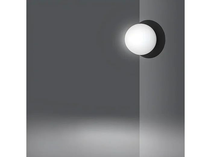 Aplique de pared Meltis estilo moderno circular negro con esfera de cristal 1xE14