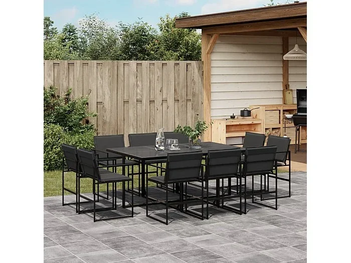 Juego de comedor de jardín 11 piezas con cojines textileno negro