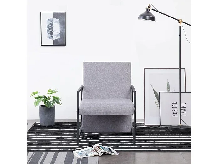 Sillón de tela gris claro