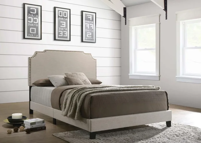 Tamarac Beige Upholstered Nailhead Eastern King Bed